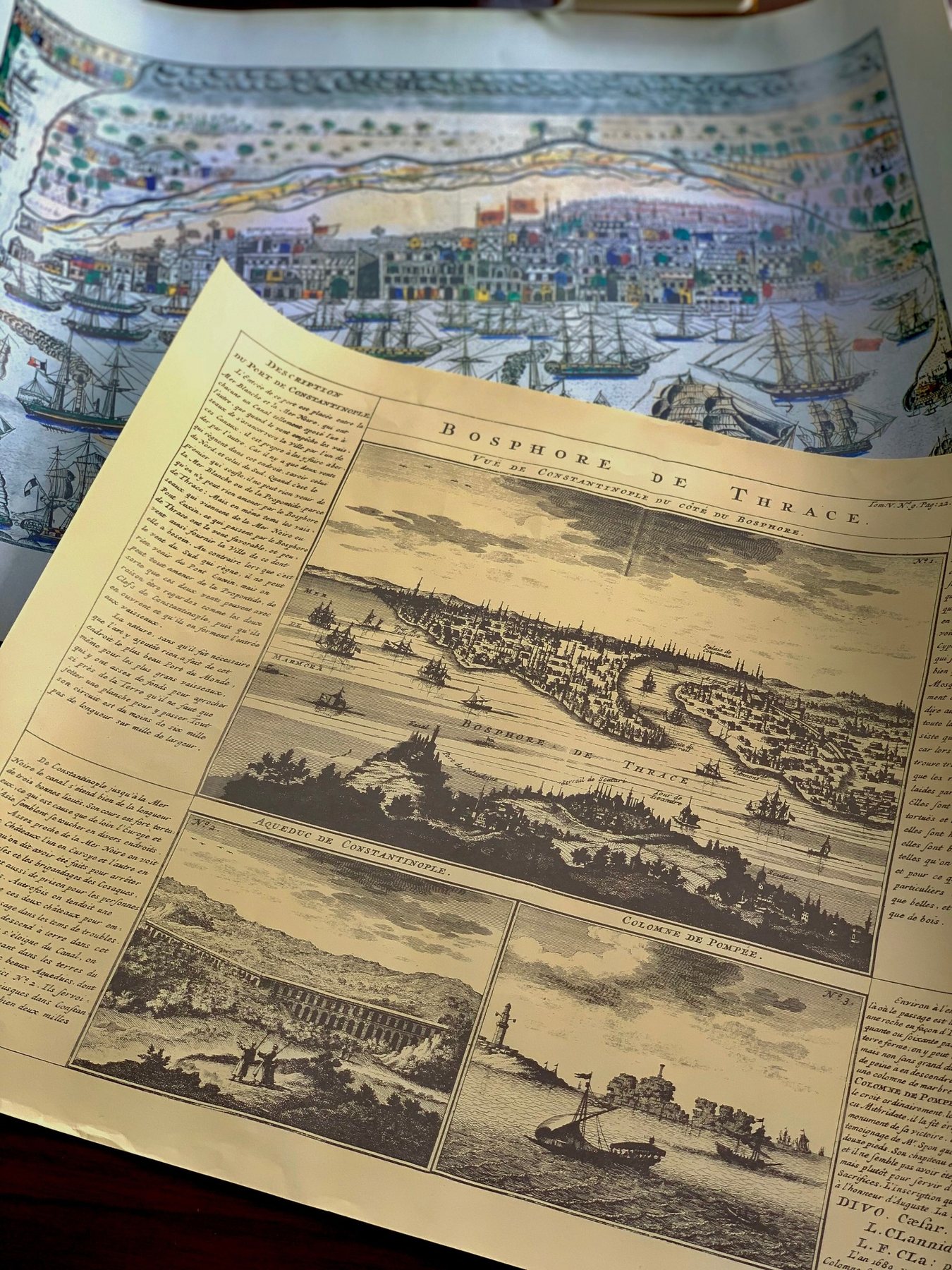 Historical map sheet on a table